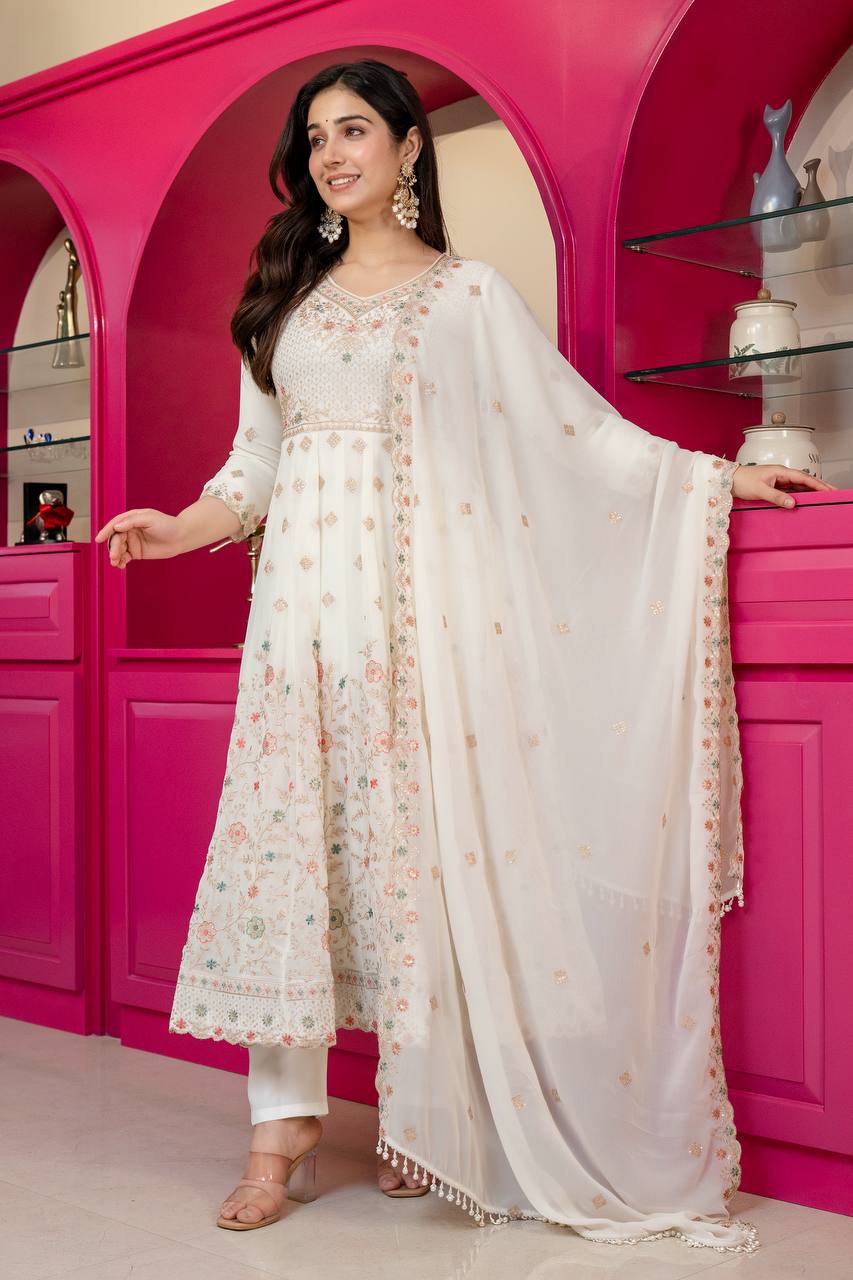 Riddhi's Decorated Zari With Embroidery Work Suit Set.