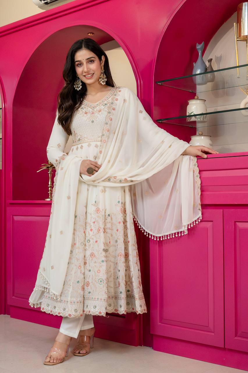 Riddhi's Decorated Zari With Embroidery Work Suit Set.