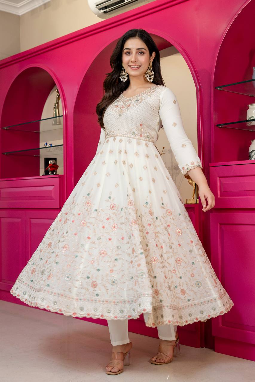 Riddhi's Decorated Zari With Embroidery Work Suit Set.